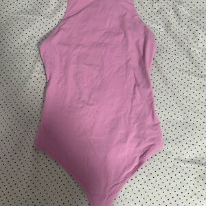 brand new pink body suit